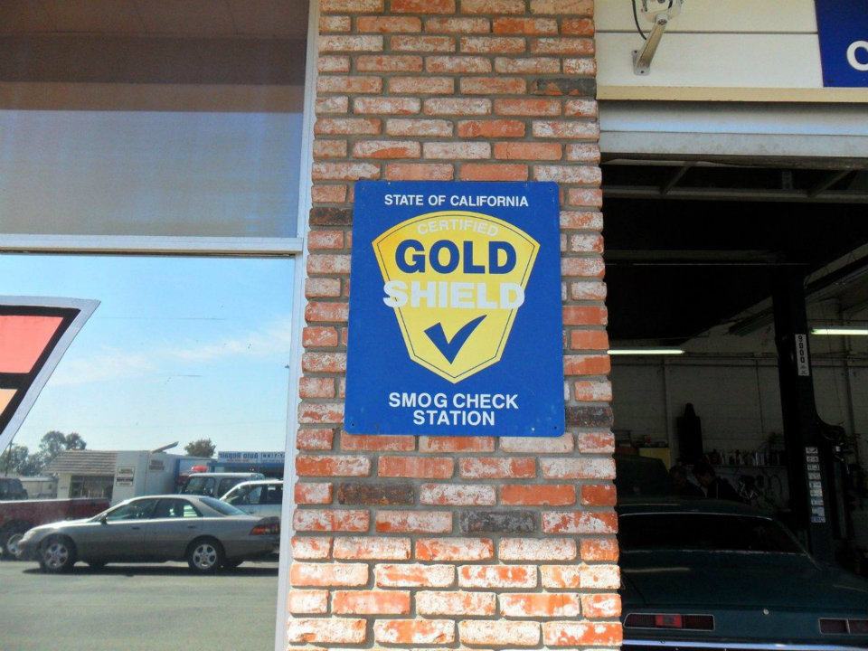 Gold Shield Certified signage on the shop exterior